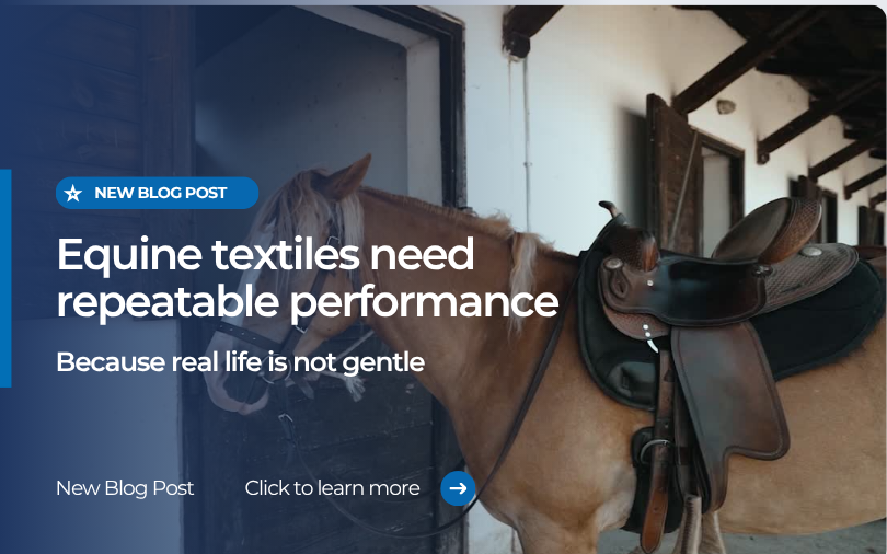 Horse standing in a stable wearing equine tack and saddle, promoting durable and repeatable performance in equine textiles.